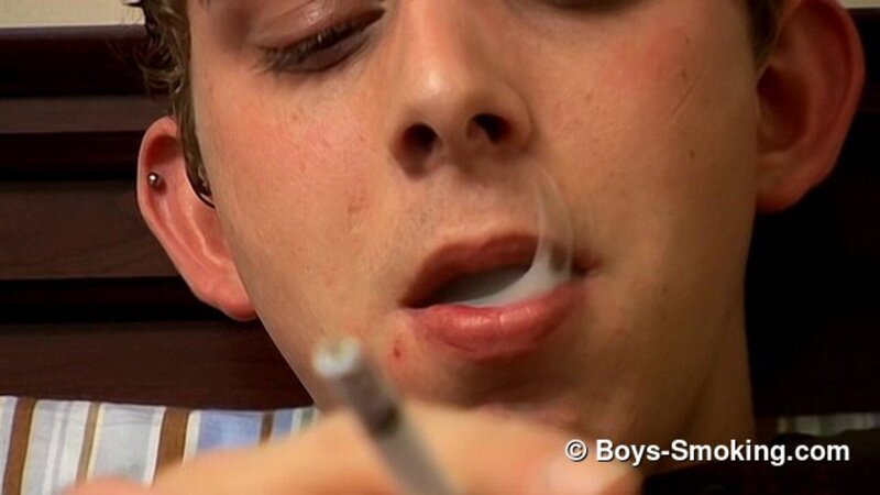 Southern chainsmoker Hoyt hauls hard on his Marlboros while jerking off