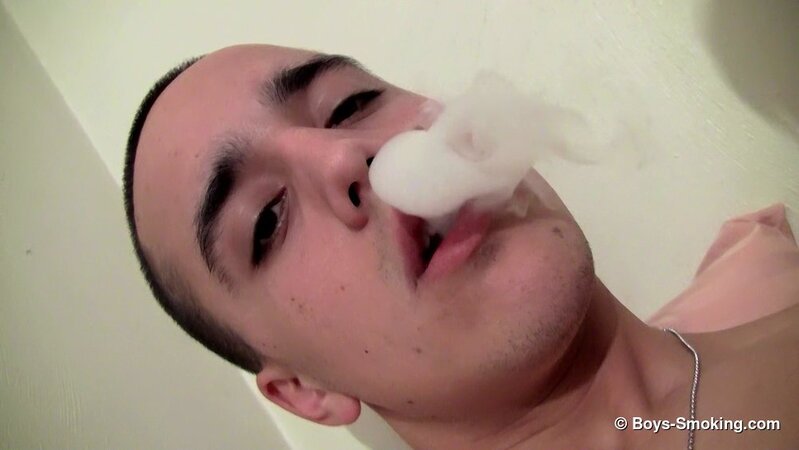 Military boy Leo McArthur strips down and smokes while stroking his hard dick