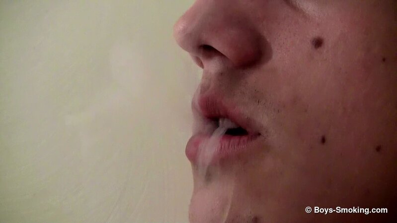 Military boy Leo McArthur strips down and smokes while stroking his hard dick