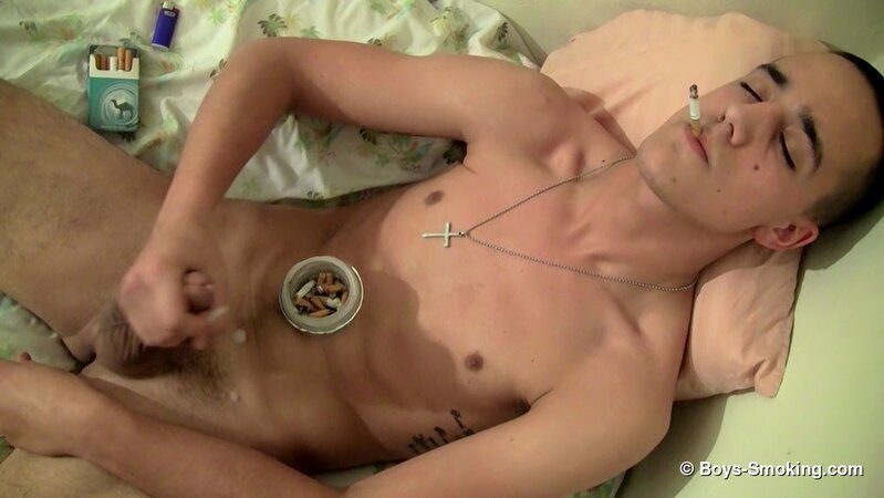 Military boy Leo McArthur strips down and smokes while stroking his hard dick