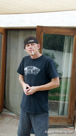 Ian Madrox chainsmokes menthols while stroking his massive cock