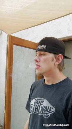 Ian Madrox chainsmokes menthols while stroking his massive cock