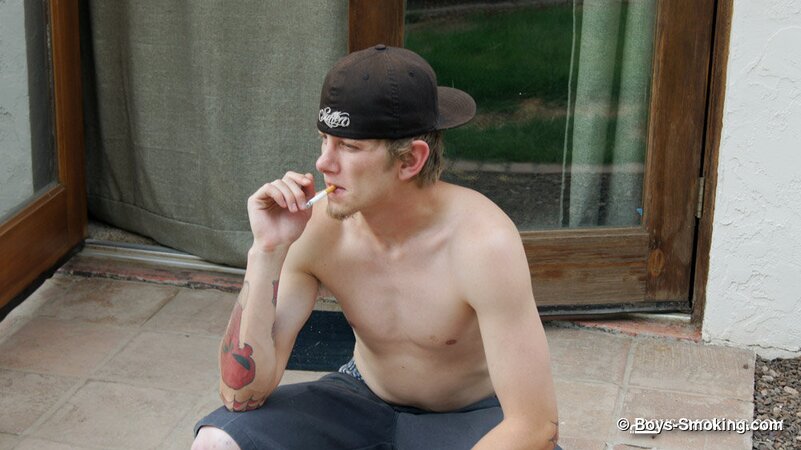 Ian Madrox chainsmokes menthols while stroking his massive cock