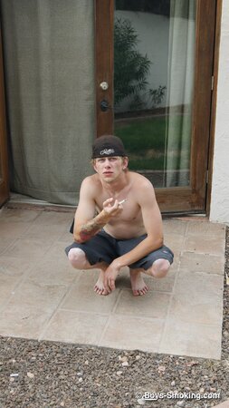 Ian Madrox chainsmokes menthols while stroking his massive cock