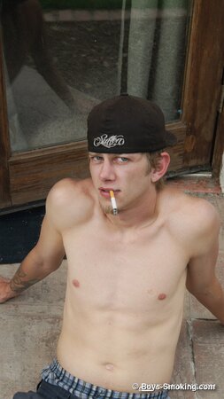 Ian Madrox chainsmokes menthols while stroking his massive cock