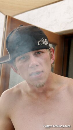 Ian Madrox chainsmokes menthols while stroking his massive cock