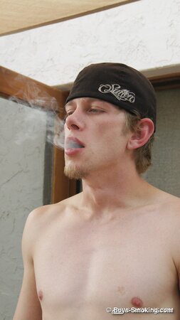 Ian Madrox chainsmokes menthols while stroking his massive cock