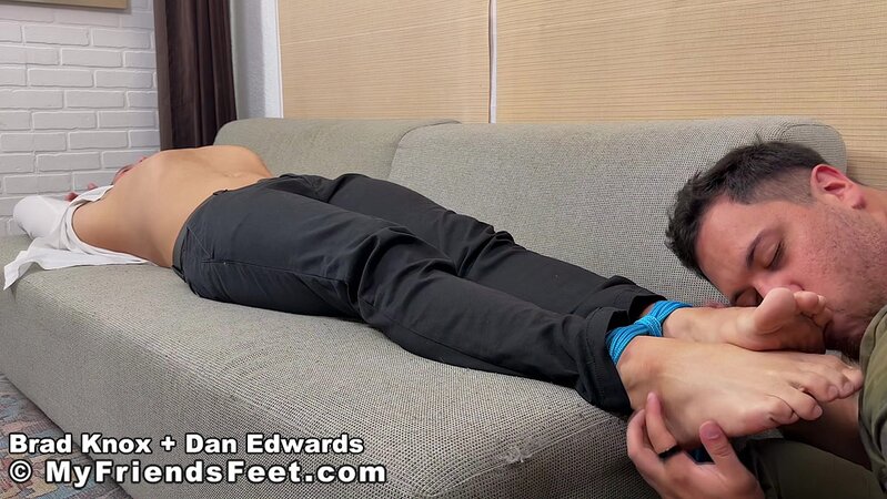 Dan Edwards worships businessman Brad Knox’s feet and body while he struggles