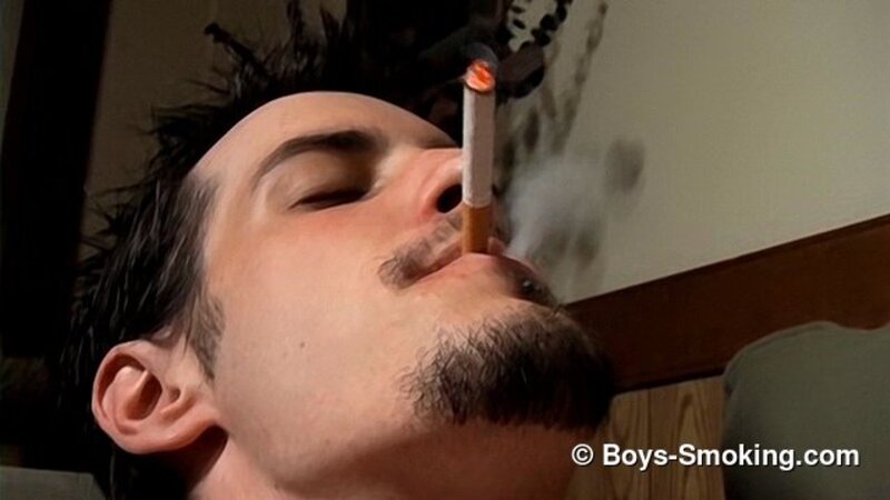 Rocker Axel smokes two cigarettes at once while playing guitar and jerking off