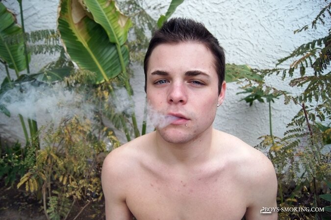 Dustin Fitch chainsmokes outdoors while stroking his big twink dick