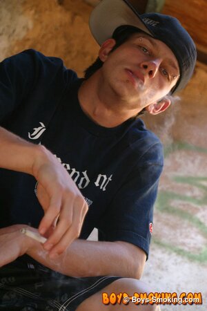 Skater boy Ian Madrox finds old porn mags and smokes while jerking his big cock