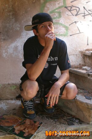 Skater boy Ian Madrox finds old porn mags and smokes while jerking his big cock