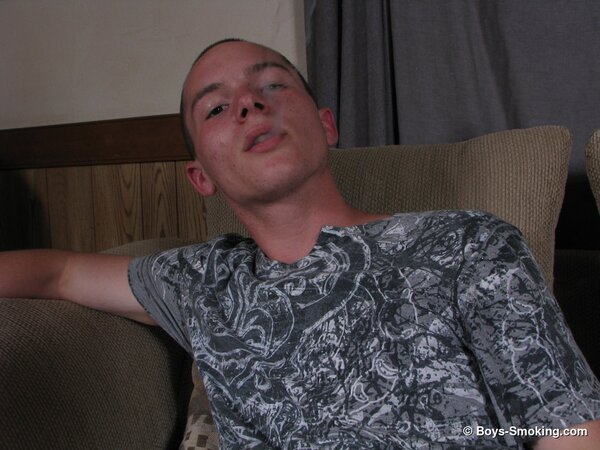 Dax chainsmokes while jerking his uncut cock