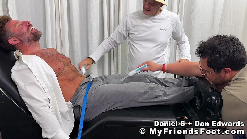Daniel S howls with laughter as Dan Edwards joins the foot tickling show