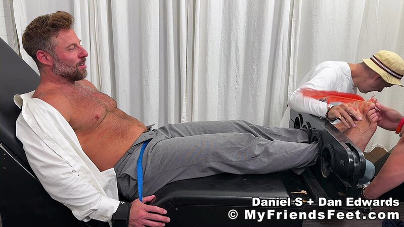 Daniel S howls with laughter as Dan Edwards joins the foot tickling show