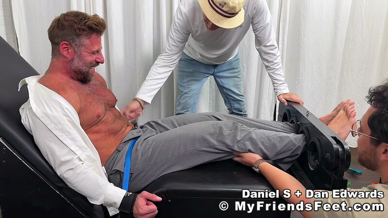 Daniel S howls with laughter as Dan Edwards joins the foot tickling show