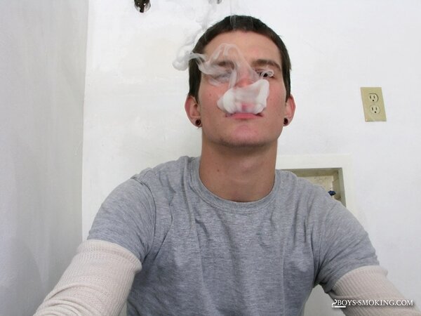 Lex smokes cigarette after cigarette while stroking his big nine inch dick