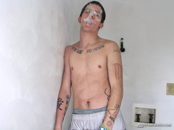 Lex smokes cigarette after cigarette while stroking his big nine inch dick
