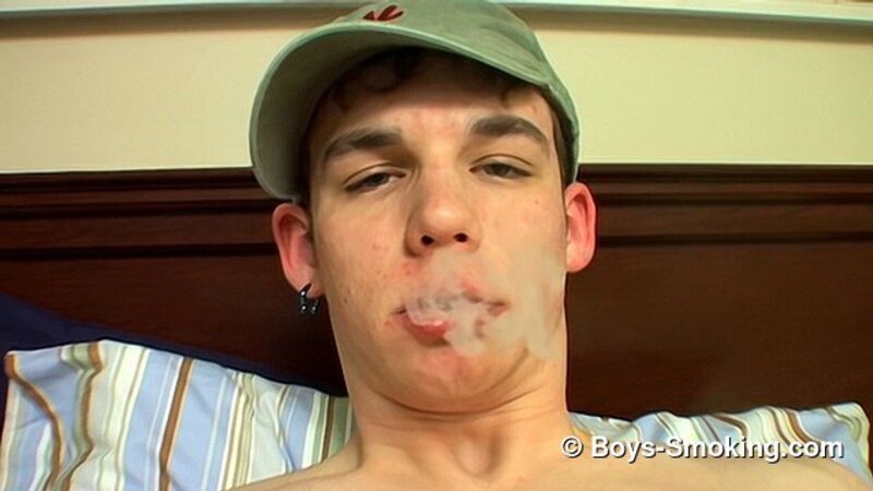 Adorable twink Kenny chainsmokes while jerking his hard cock