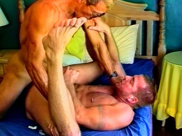 Muscular daddies John Nagel and David Griffin share an intense bedroom fuck