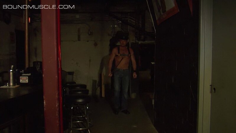 Chad Brock plugs a puppy tail into Alan Rhodes to pay off a heavy bar tab
