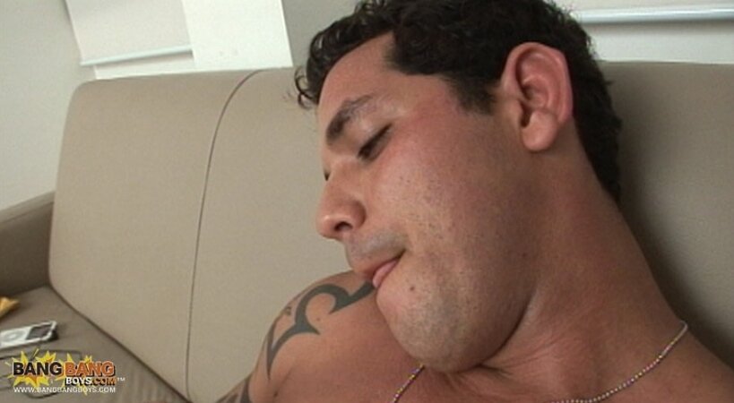 Junior F listens to his iPod on the couch before starting a horny solo session