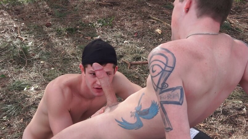 Seth Alexander feeds his huge nine inch cock down the throat of Mickey Knox