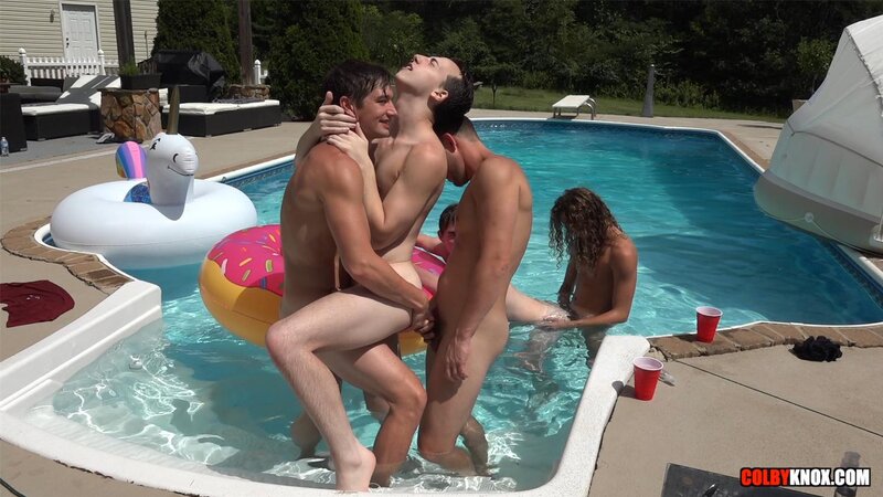 Colby Chambers and Mickey Knox enjoy a butt buffet at a pool party