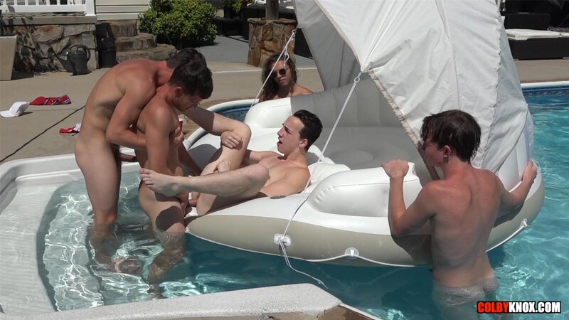 Colby Chambers and Mickey Knox enjoy a butt buffet at a pool party