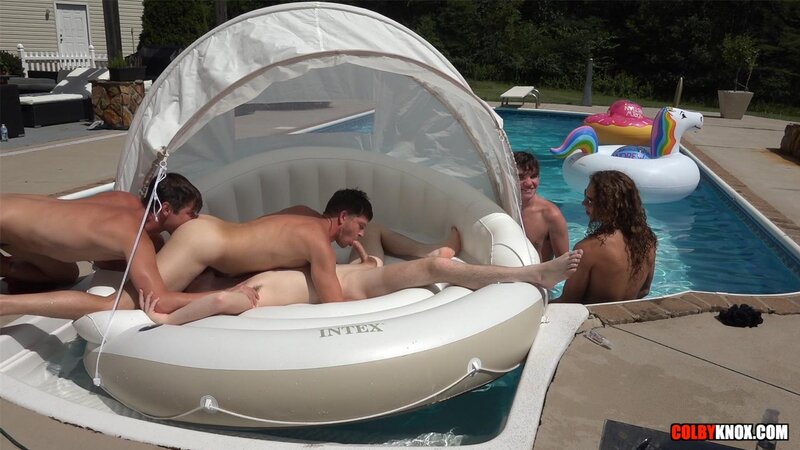 Colby Chambers and Mickey Knox enjoy a butt buffet at a pool party