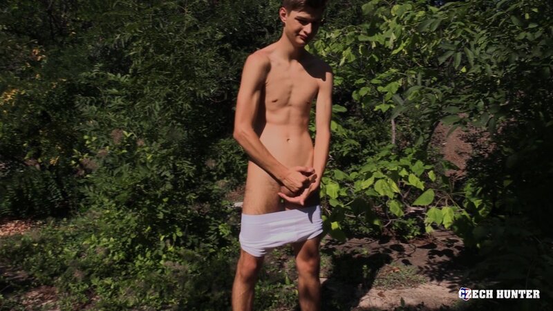 A nineteen year old cyclist gets his sweet teenage ass drilled on grass