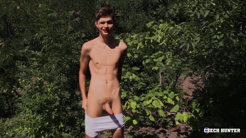 A nineteen year old cyclist gets his sweet teenage ass drilled on grass