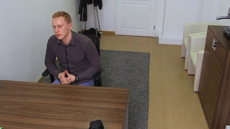A shy ginger job seeker gets tested with a red dildo in the office