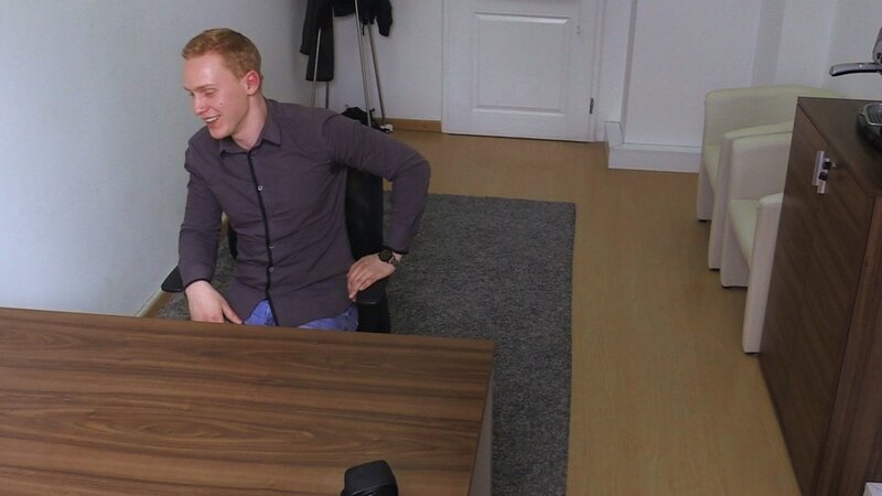 A shy ginger job seeker gets tested with a red dildo in the office