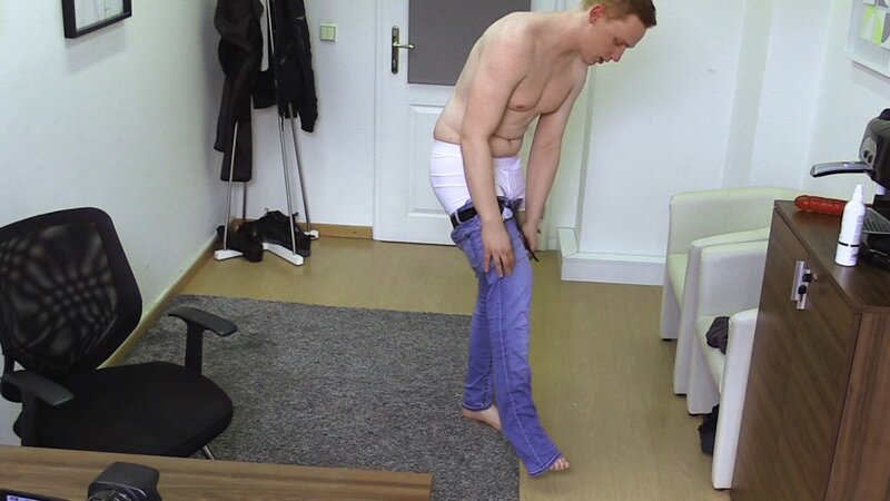 A shy ginger job seeker gets tested with a red dildo in the office