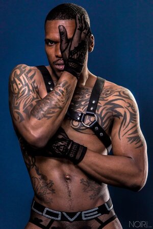 Aaron Reese shows off his tattooed body during an intense solo show