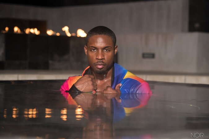 Deangelo Jackson takes his solo session outdoors by the side of the pool