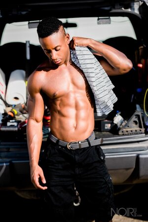 Liam Cyber gets totally naked to show off his smooth muscle body