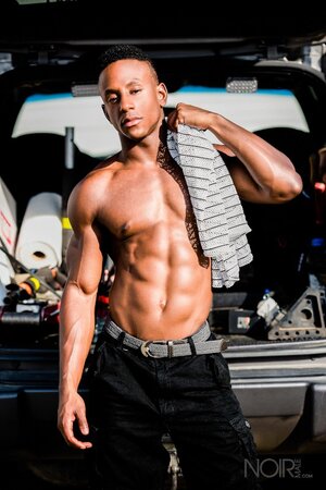 Liam Cyber gets totally naked to show off his smooth muscle body