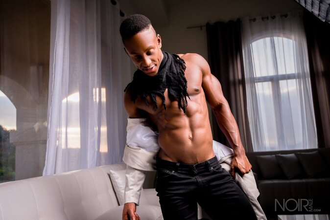 Liam Cyber gets totally naked to show off his smooth muscle body