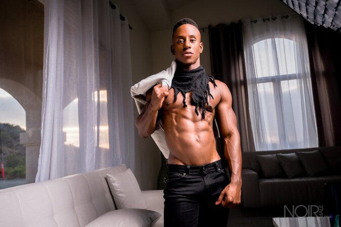 Liam Cyber gets totally naked to show off his smooth muscle body
