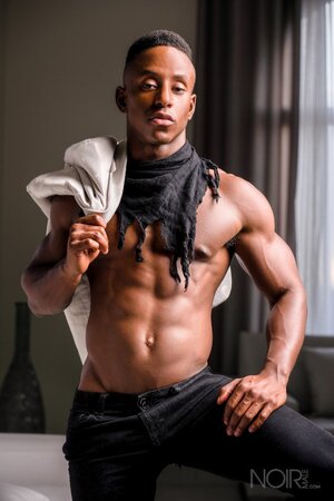 Liam Cyber gets totally naked to show off his smooth muscle body