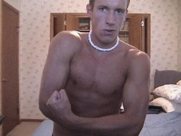 Young man shows his awesome male package