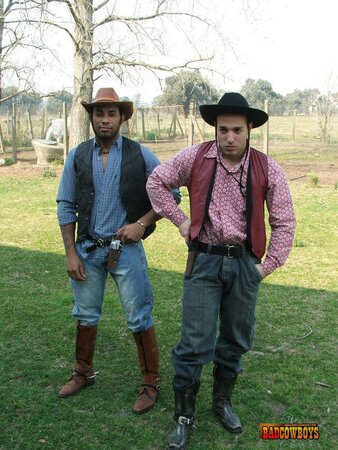 Two cowboy raiders rob, fuck and feed cute guy