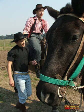 Two cowboy raiders rob, fuck and feed cute guy