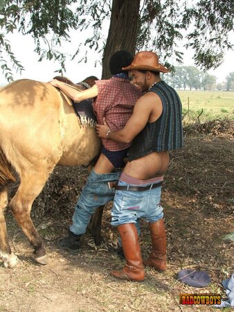 Cute twink taking good care of cowboy dicks