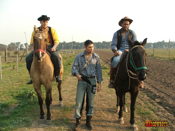 Cute guy fucked by two roadside cowboys