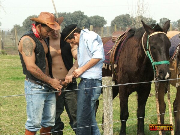 Eager victim double-fucked by gay cowboys