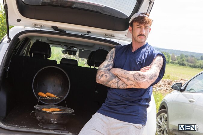 Evan Jordie spots Adam Banks teasing at the tailgate and takes him behind the grill
