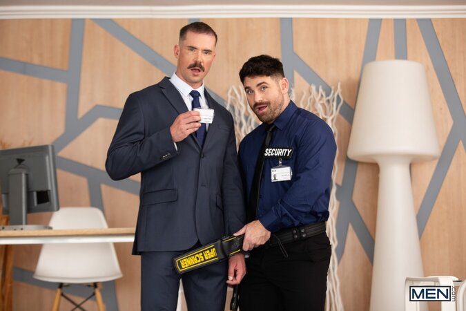 Security guard Beau Butler gives Adam Tyrant an intimate office search